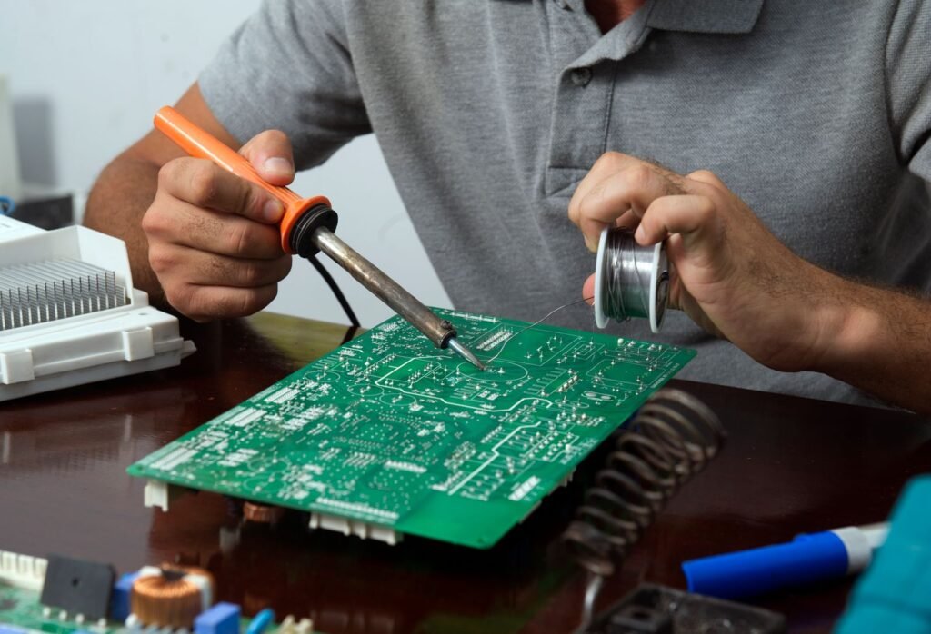 Engineer working on a circuit board